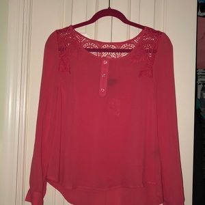 Pink blouse with lace pattern on back